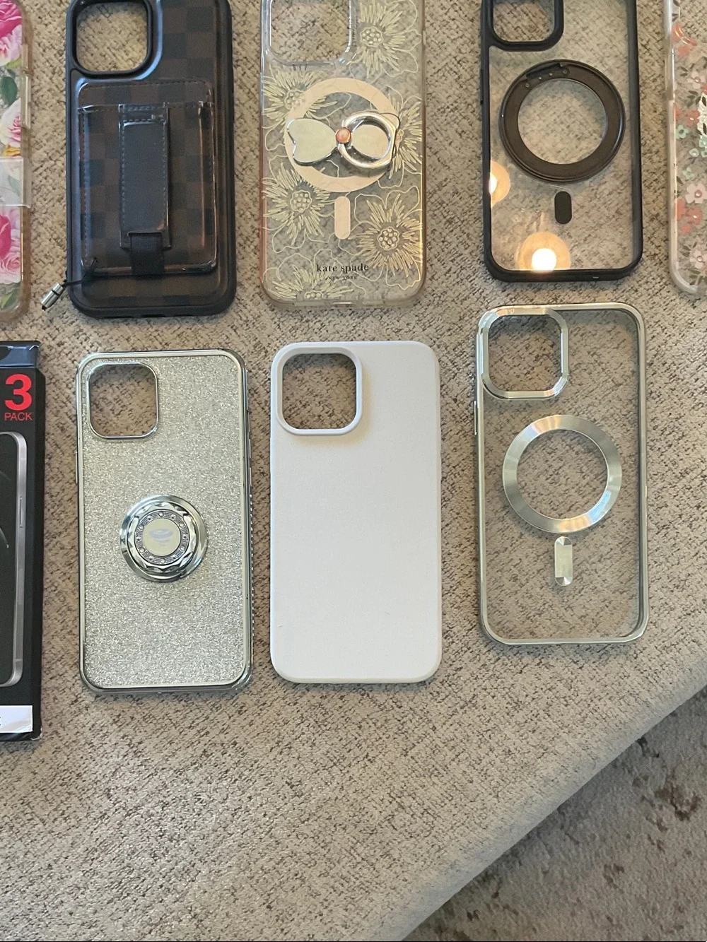 Assorted IPhone 12 Pro Max Phone cases and Screen Protectors